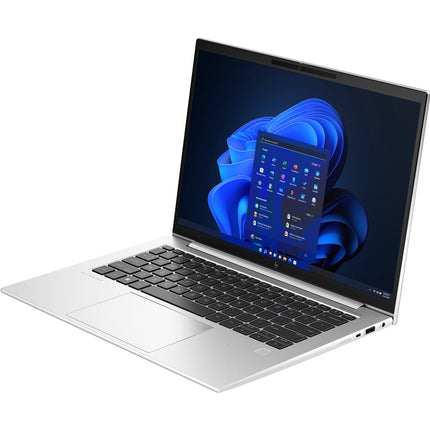 Angled view of a refurbished HP EliteBook 845 G10, silver with black keyboard, on white background showing Windows 11 home screen. - View 4