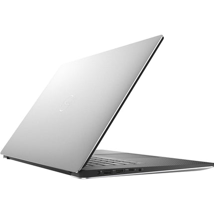 Angled view of a closed silver Dell XPS 15 7590 laptop, showing the lid and side ports. - View 2