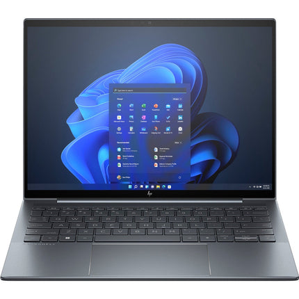 Front view of a stylish refurbished HP DRAGONFLY G4 laptop, showcasing its 13.5-inch touch display with keyboard and touchpad visible. The screen displays the Windows 11 start menu over a blue abstract background. This model features an Intel Core i7-1365U processor, 32GB DDR4 RAM, and a 1TB NVMe SSD, combining high performance with modern design—ideal for versatile computing needs. - View 1