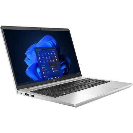 Angled view of a silver HP ProBook 440 G9 14″ FHD laptop with a black keyboard and blue desktop interface. - View 5
