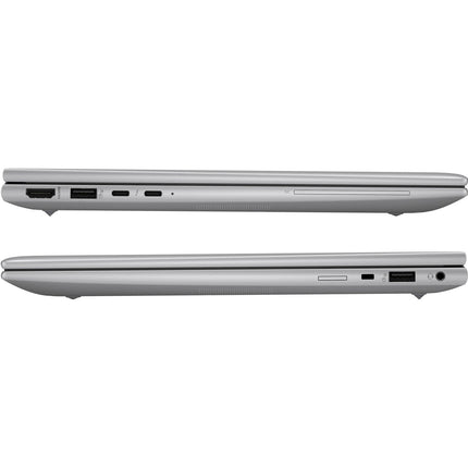 Side view of two closed silver refurbished HP ZBOOK FIREFLY 14 G11 laptops, showing slim profiles, USB, HDMI, and SD ports. - View 3