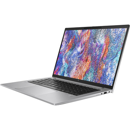 Angled view of a refurbished silver HP ZBOOK FIREFLY 14 G11 A laptop, open with colorful display and black keyboard visible. - View 4