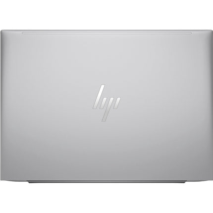 Front view of a closed silver HP ZBOOK FIREFLY 14 G11 A on white, HP logo centered; refurbished 14" FHD AMD Ryzen 5 laptop. - View 2