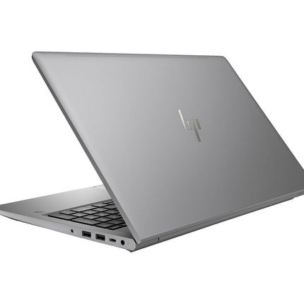 Angled view of a silver refurbished HP ZBOOK Power G10, 15.6″, highlighting its keyboard, visible ports, and HP logo, with key specs including Intel Core i7-13800H, 32GB RAM, 1TB NVMe SSD, and NVIDIA RTX A1000 graphics. - View 2