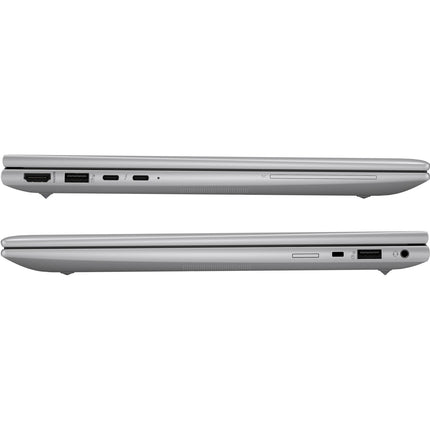 Side view of two closed silver refurbished HP ZBOOK FIREFLY 14 G11 laptops, showing slim profiles, USB, HDMI, and SD ports. - View 3